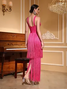 Detailed view of the layered fringe on a hot pink bandage dress for gala events