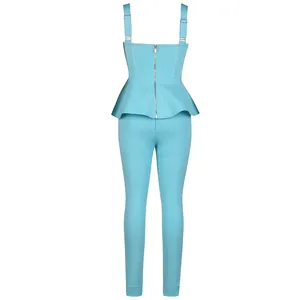 Rear view of light blue ribbed knit two-piece set with peplum top and trousers