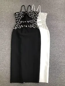 Close-up detail of sexy beaded rhinestone bandage dress with elegant cutout design