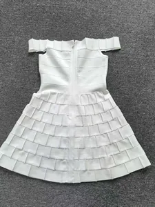 Detailed view of white off-the-shoulder bandage A-line dress featuring central back zipper