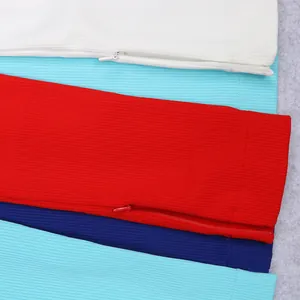 Close-up view of ribbed knitted fabric and invisible zipper detail for bandage sets