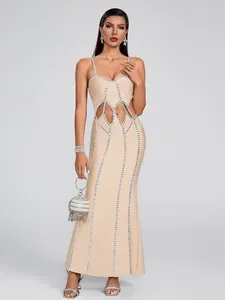 Elegant champagne bandage maxi dress with rhinestone details and waist cut-outs