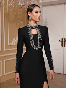 Close-up of a black long-sleeve bandage dress with luxurious silver beaded embellishments