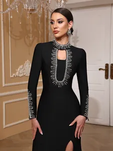 Detailed view of elegant black long-sleeve bandage dress with heavy rhinestone beadwork