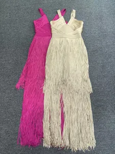 Deep V-neck fringed bandage dresses in magenta and champagne for elegant evening events.