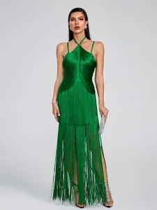 Full-body view of a sophisticated green halter maxi dress with layered fringe details