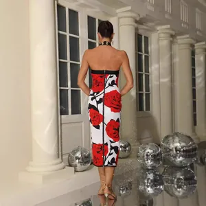 Elegant halter neck bandage dress with red rose print and sexy backless design.