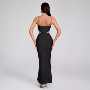 Elegant black bandage maxi dress with rhinestone straps and waist cut-out details.