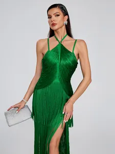 Detailed view of a stunning emerald green halter neck fringe dress for gala parties