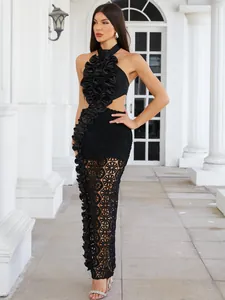 Elegant black halter evening gown with intricate lace hollow-out and ruffle details