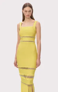 Elegant yellow bandage midi dress with silver bead accents and long fringe hemline