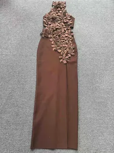 Detail view of coffee bandage evening dress with cascading 3D floral appliqués