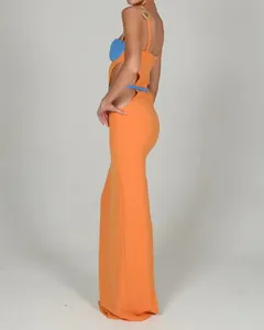 Elegant orange bandage maxi dress with blue accents and gold heart detail cutout