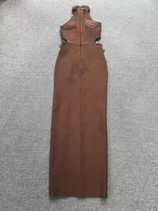 Brown bandage bodycon maxi dress with halter neck and side cut-outs, elegant evening gown.