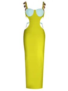 Detailed view of lime green bandage maxi dress with cut-outs and metal strap accents