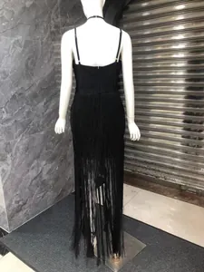 Detailed back view of sexy black strap evening party dress with long tassel fringe hem