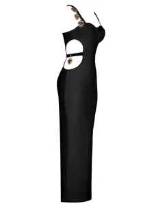 Detailed side view of a black bandage maxi dress featuring heart-shaped metal charms