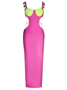 Full view of hot pink bandage dress with neon green cut-outs and metal jewelry straps