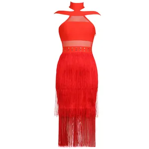 Detailed view of red halter bandage dress with mesh panels and long fringe tassels