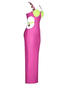 Side view detail of a vibrant pink and lime green bandage dress with metal heart charms.