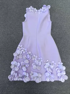 Detailed back view of an elegant lilac bandage dress featuring 3D floral appliqués.