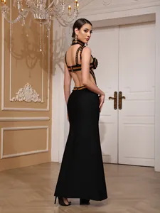 Elegant detail showing backless black and gold beaded bandage evening dress with matching choker