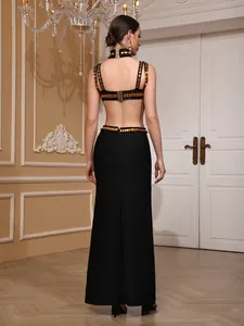 Elegant back view of black bandage evening dress with gold bead detailing and open back