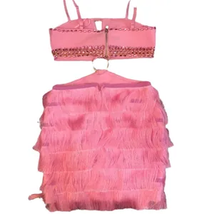 Sexy pink two-piece bandage skirt set with rhinestone crop top and layered fringed mini skirt