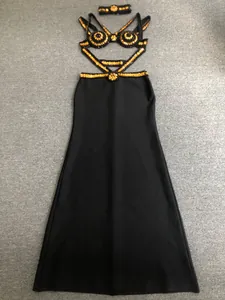 Detailed view of sexy black and gold beaded bandage evening dress with neck collar accessory