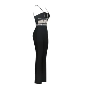 Detailed side view of a black sleeveless jumpsuit with mesh panels and rhinestone accents
