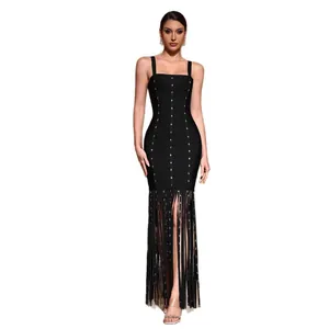 Sleeveless black bandage evening dress featuring sparkling studs and long fringe hem detail.