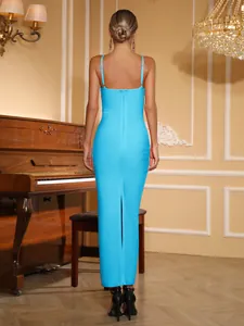Back view detail of elegant cyan bandage maxi dress showing slim fit and rear slit