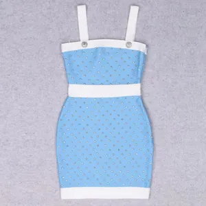 Close-up detail of rhinestone-studded blue and white bandage bodycon party dress