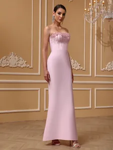 Elegant pink strapless bandage fishtail evening gown with beaded fringe detailing