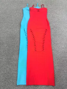 Front view of red and light blue bodycon bandage evening dresses on gray carpet background