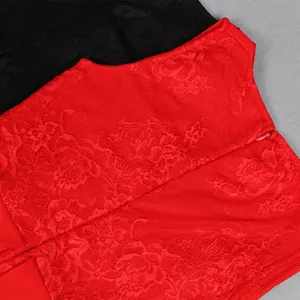 Detailed macro view of delicate red rose lace fabric on a sleeveless bandage dress