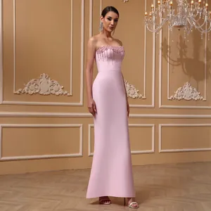 Elegant pink strapless evening gown with sequin beaded details and slim fit mermaid hemline