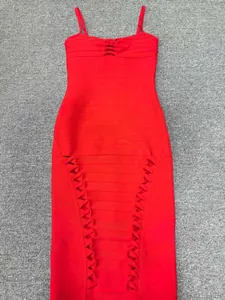 Close-up detail of a vibrant red bandage midi dress featuring elegant side cut-out patterns