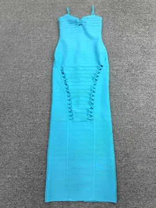 Close-up detail of a turquoise blue bodycon bandage dress with a unique braided texture
