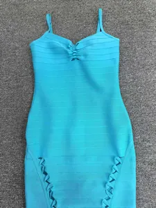 Elegant cyan blue slim-fit bandage dress featuring knot detail and a decorative hem.