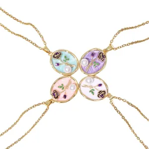 Elegant vintage oil painting style rose and pearl pendant necklaces available in four colors.