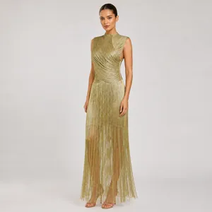 Detailed view of elegant sleeveless gold fringe bandage gown for formal gala occasions