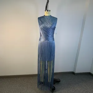 Detailed view of the sleeveless light blue evening gown with silver fringe details.