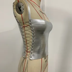 Side view of silver metallic bandage camisole with lace-up detail