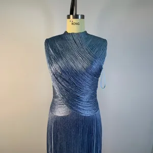 Detailed texture of shimmering light blue silver fringe sleeveless bandage dress.