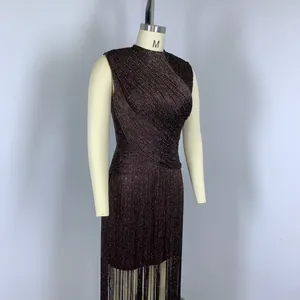 Close-up of a sleeveless glitter fringe bandage evening dress with an elegant slim fit design