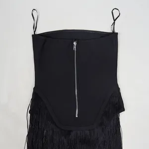 Detailed view of chic black fringe patchwork bandeau jumpsuit with front silver zipper