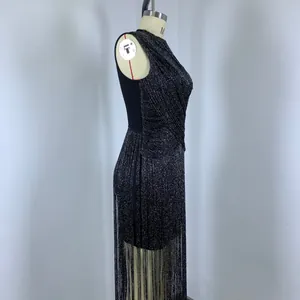Side view detail of sleeveless silver fringe bandage dress on a mannequin