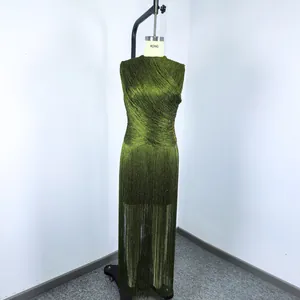 Macro view of elegant olive green sleeveless fringed bandage dress for evening party