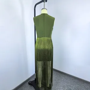 Back view of green sleeveless fringe bandage dress with shimmering silver thread details